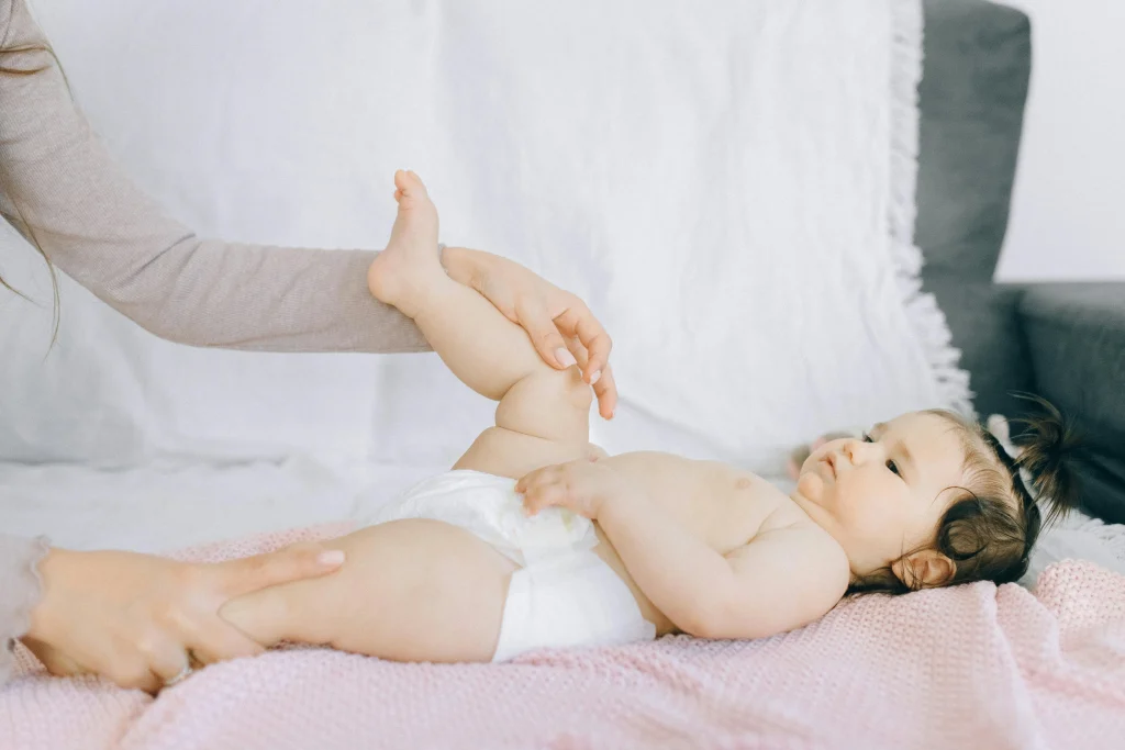 15 Things to Do with a 4-Month-Old Baby: Gentle, Brain-Boosting Activities 11 baby gas bicycle massage