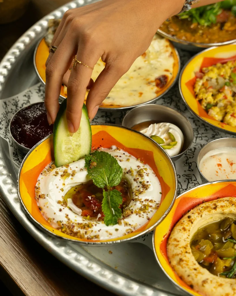 Fun Ways to Get Toddlers Eating Vegetables (Without the Mealtime Battles!) 4 dipping cucambber in sauce