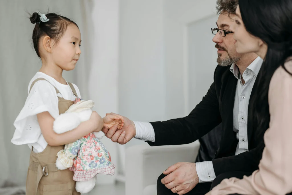 How to Handle Toddler Separation Anxiety: Gentle & Effective Tips 8 family handshake