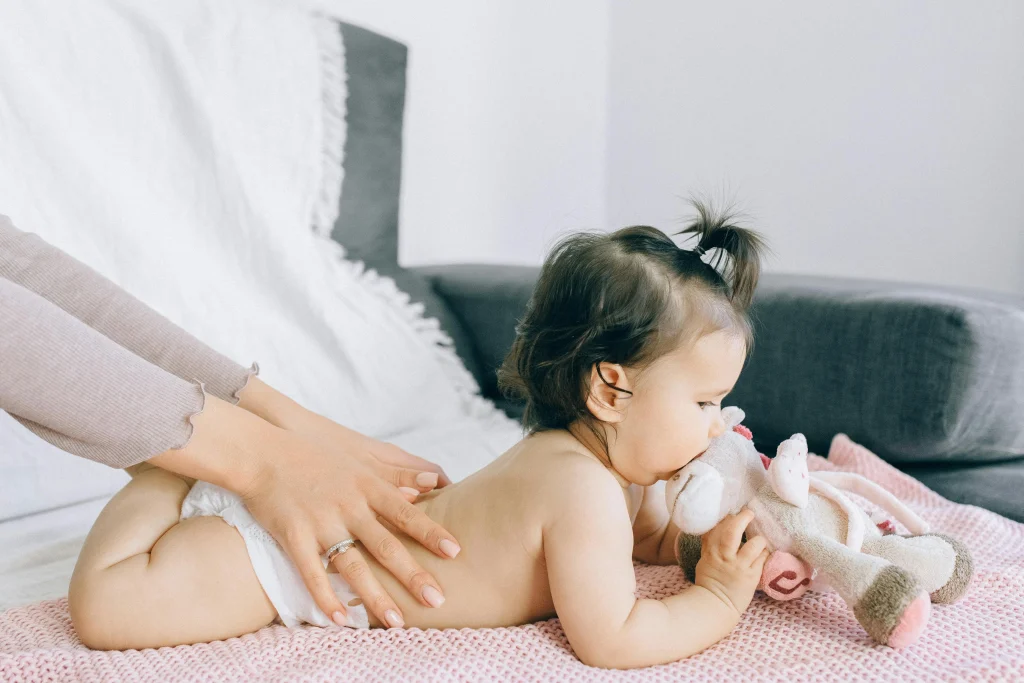 25 Engaging Tummy Time Ideas to Help Your Baby Grow Strong 16 baby gentle massage