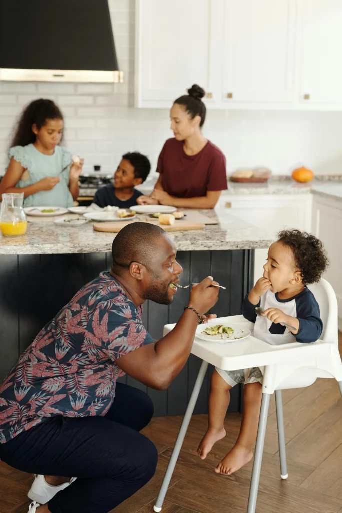 Fun Ways to Get Toddlers Eating Vegetables (Without the Mealtime Battles!) 16 toddler copying father for eating