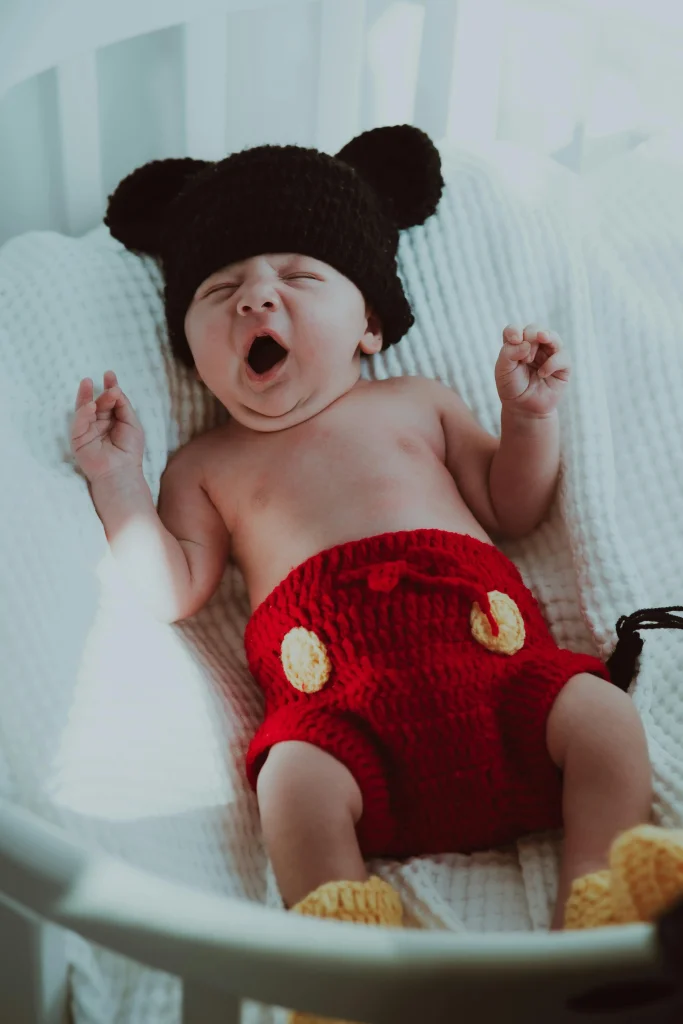 Baby Sleep Secrets: Proven Tips to Help Your Little One Sleep Through the Night 13 baby yawning after a beauty sleep